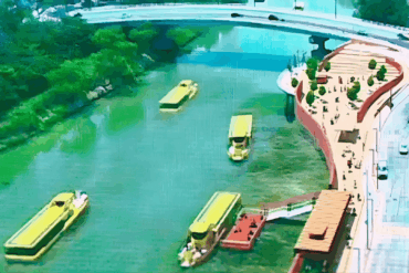 Lanchas de transporte acuático circulan por un canal urbano, referencia internacional de movilidad fluvial.