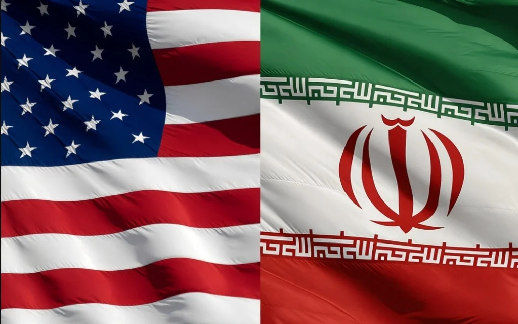 Banderas de Estados Unidos e Irán ondeando una junto a la otra