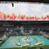 Ceremonia inaugural del Mundial 2026 en el Estadio Ciudad de México con escenario central de FIFA y tribunas llenas.
