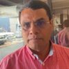 Jesús Selván García, dirigente estatal de Morena en Tabasco, con camisa roja de cuadros, durante una entrevista